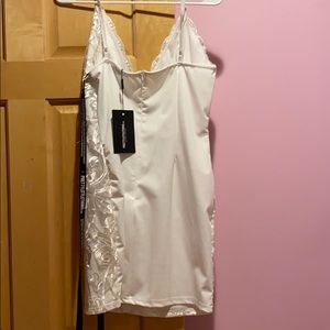 white embroidered lace detail plunge bodycon dress